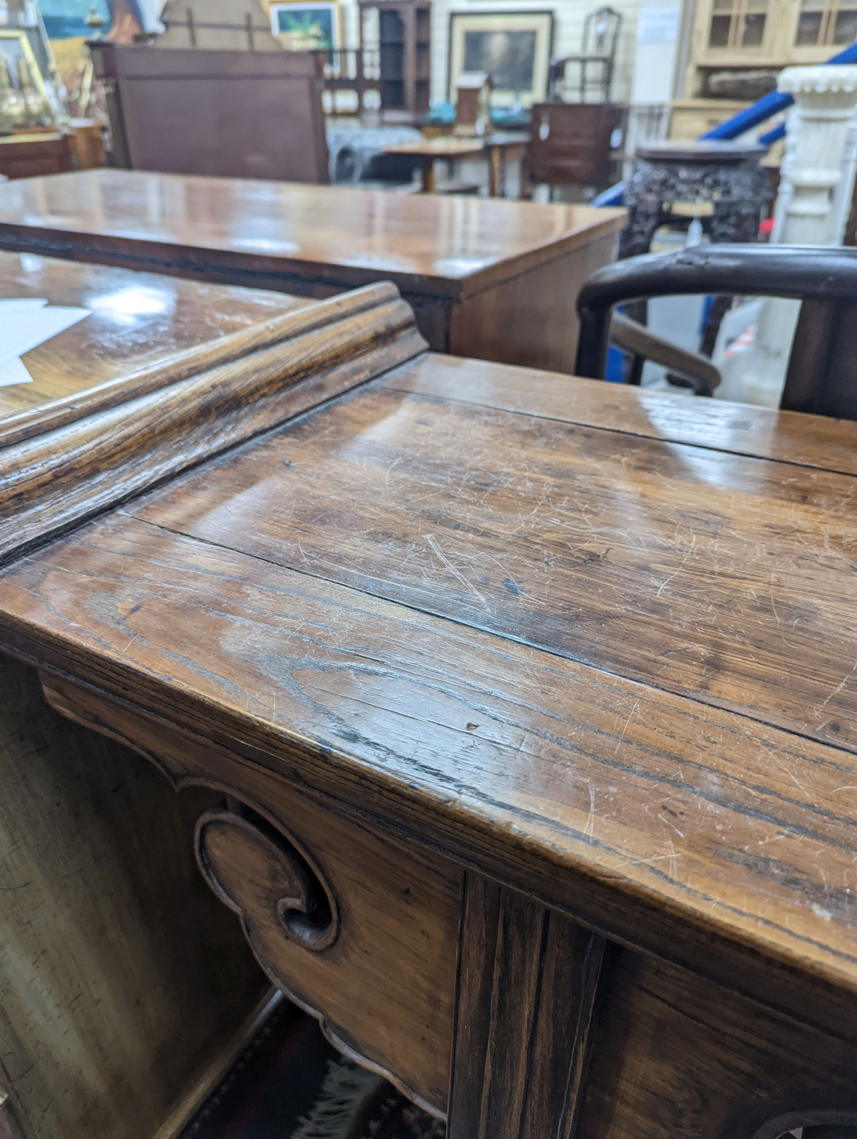 A Chinese elm and cypress wood altar table, 17th/18th Century, 168 cm long, 43 cm deep, 93 cm high, length reduced